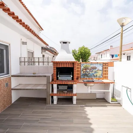 With Garden And Barbecue